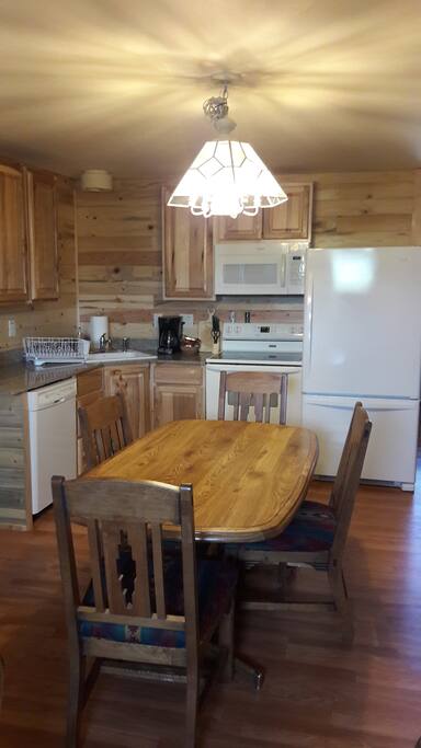 Full Kitchen with seating for up to 6. Fully stocked with all dishes, glassware, flatware, pots/pans etc.