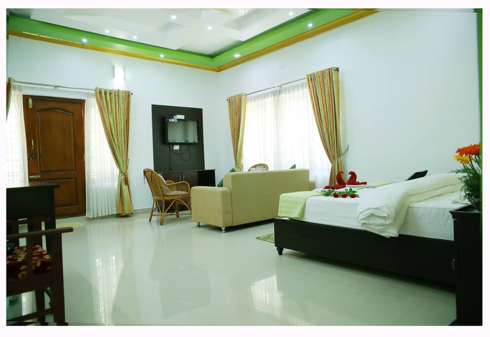 Spacious Double Deluxe Room at Periyar Villa