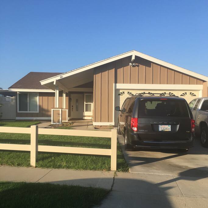 We built a 6' vinyl fence around our side yards and backyard for complete privacy. The front yard, right side yard, and half the back yard have new sod while the left side yard and other half of the back yard have a covered deck and outdoor kitchen. We have two parking spaces in the new driveway and unlimited parking on the curb. Our neighborhood is not busy so there is always plenty of parking. d