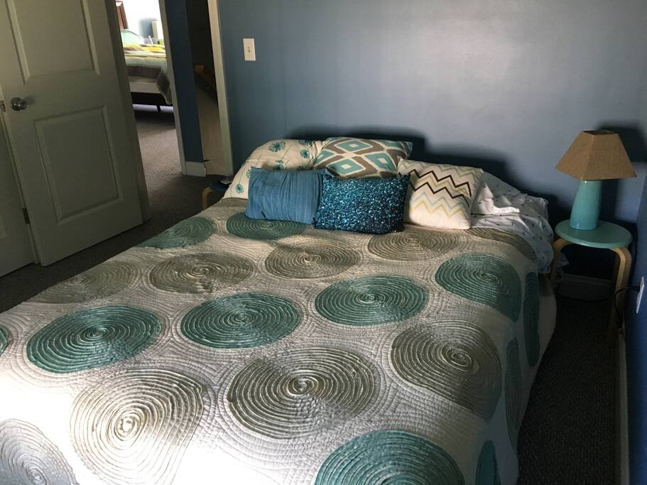 main bedroom with queen bed