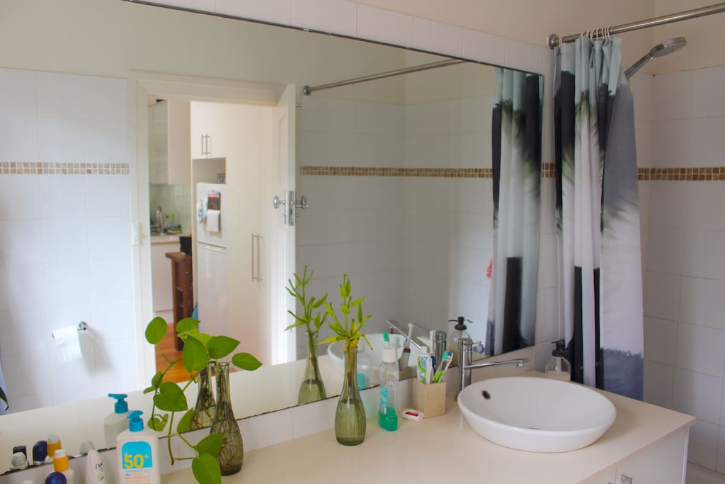 Bathroom with shower and bath