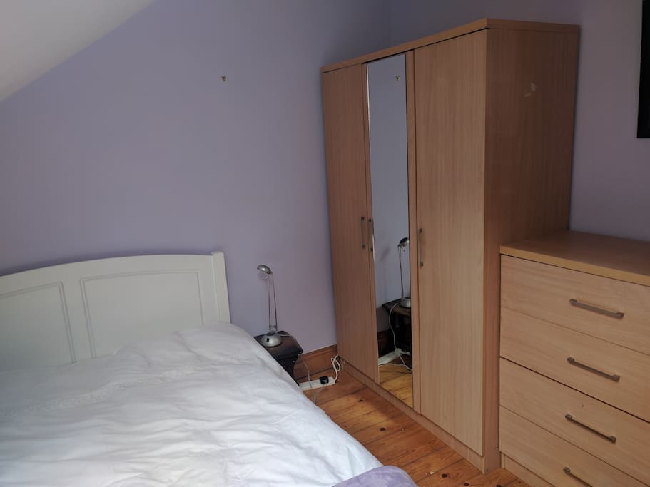 Large wardrobe and chest of drawers.