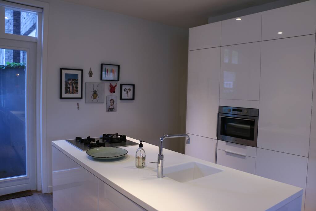 kitchen with steam oven and quooker