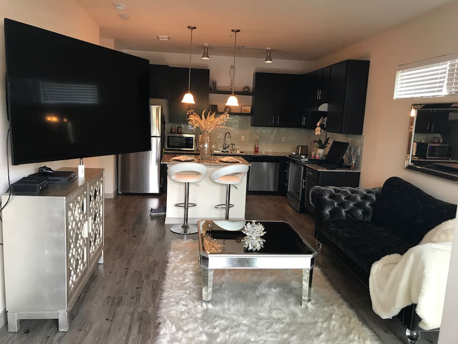 High end Luxurious Furniture Topped with a 70" 4K TV’s PS4 Pro. Wireless