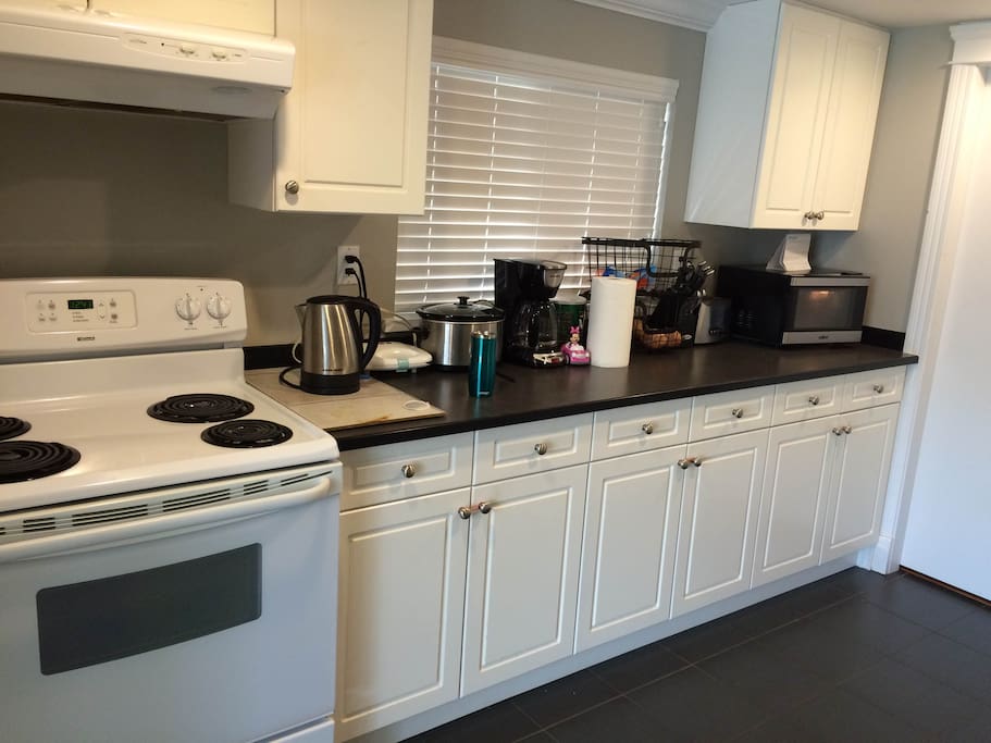 Full kitchen with dishwasher and lots of storage space