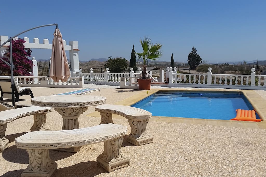 Tabled terrace for lunching by the pool
