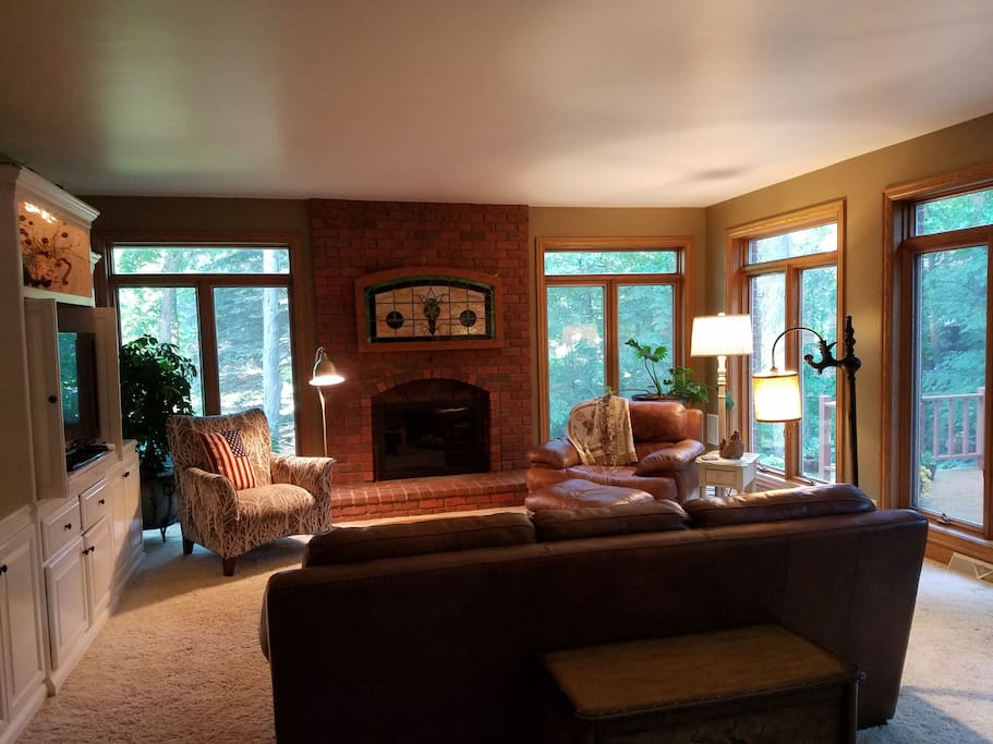 living room with a forest view.
