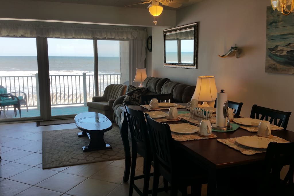 Dining area with 6 high chairs and high table; all dishes & silverware included!