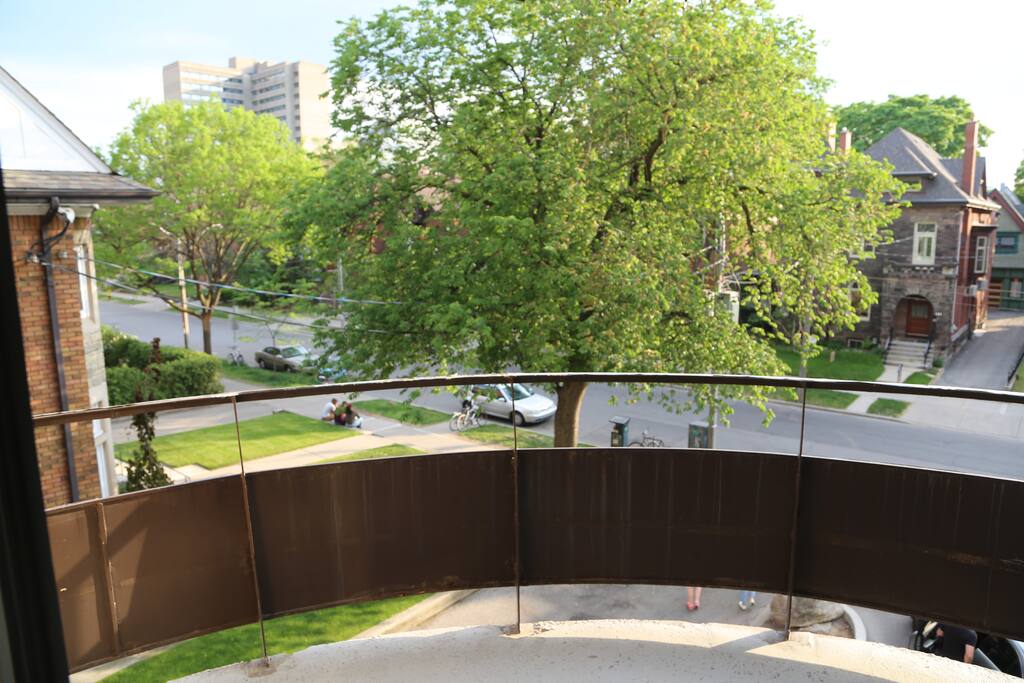 The charming balcony gives you a great view of the serene and historic Huron street.