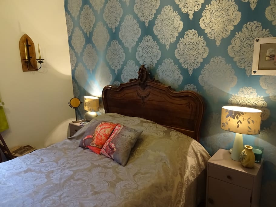 Ground floor French themed bedroom with Genuine 18th century French bed with modern mattress an foam topper