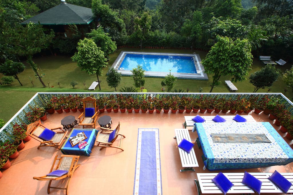 view of the pool and terrace from the library