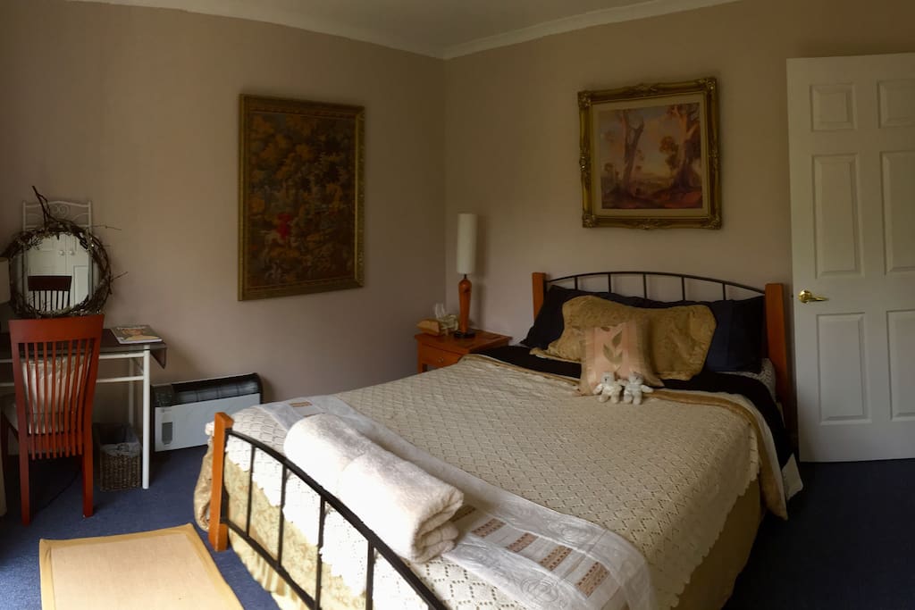 The Gold Rush room with queen bed.