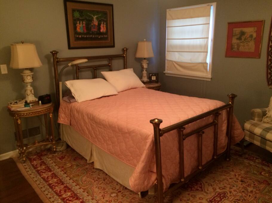 Master bedroom with regular sized, extra firm mattress
