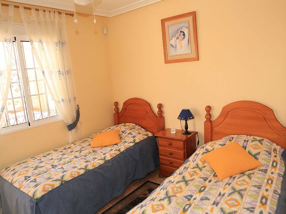 Bedroom with two single beds