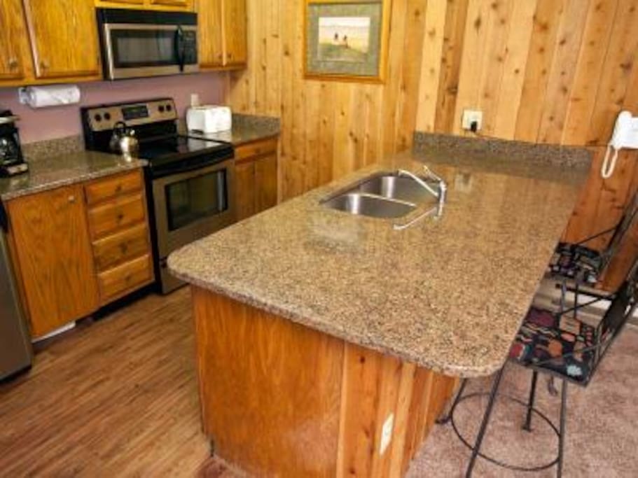 Updated full kitchen with granite counter tops and stainless steal appliances