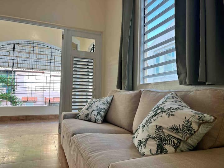 Livingroom with large couch perfect for napping 