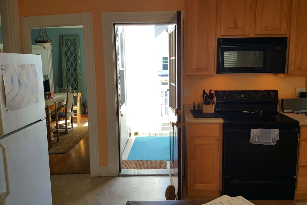 Kitchen opens up to private sunny porch