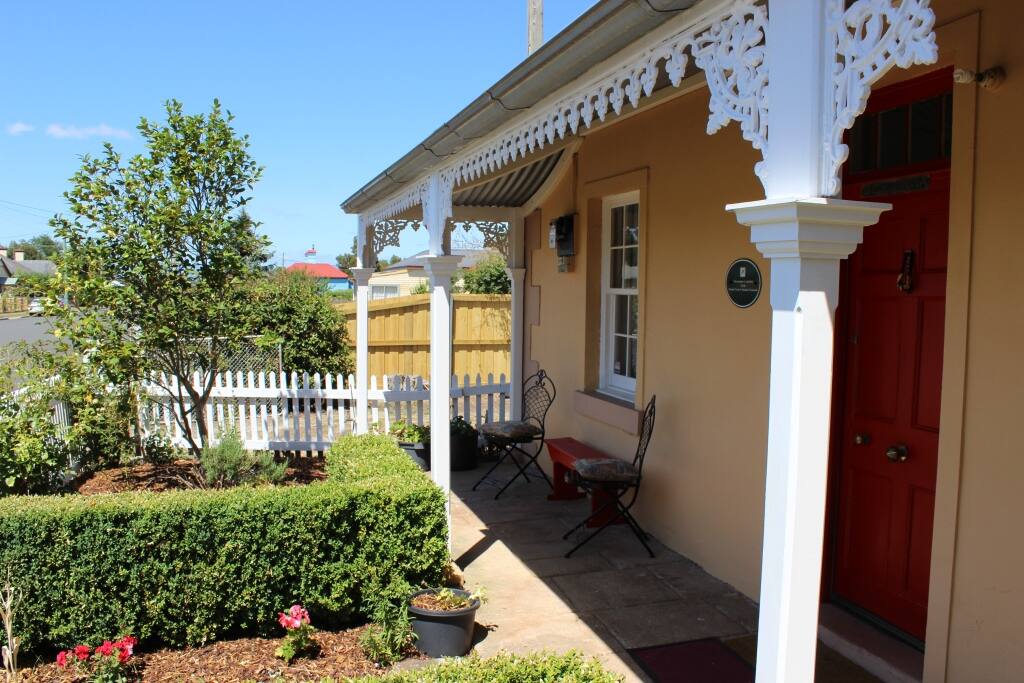 Sunny garden and front porch.