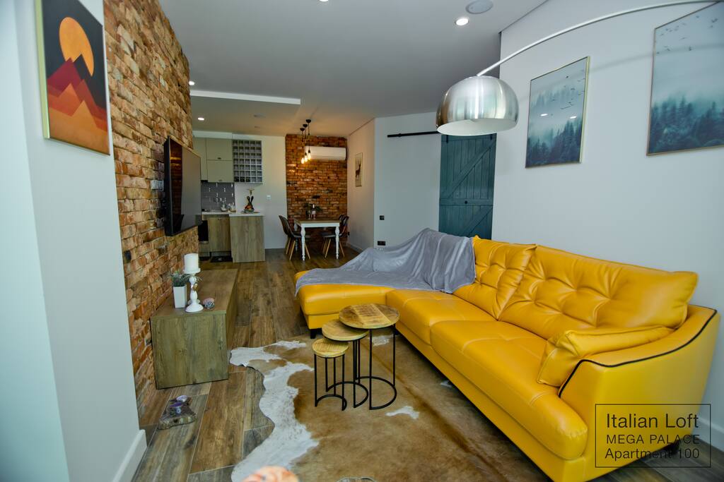 Living room/ kitchen area/ dining area