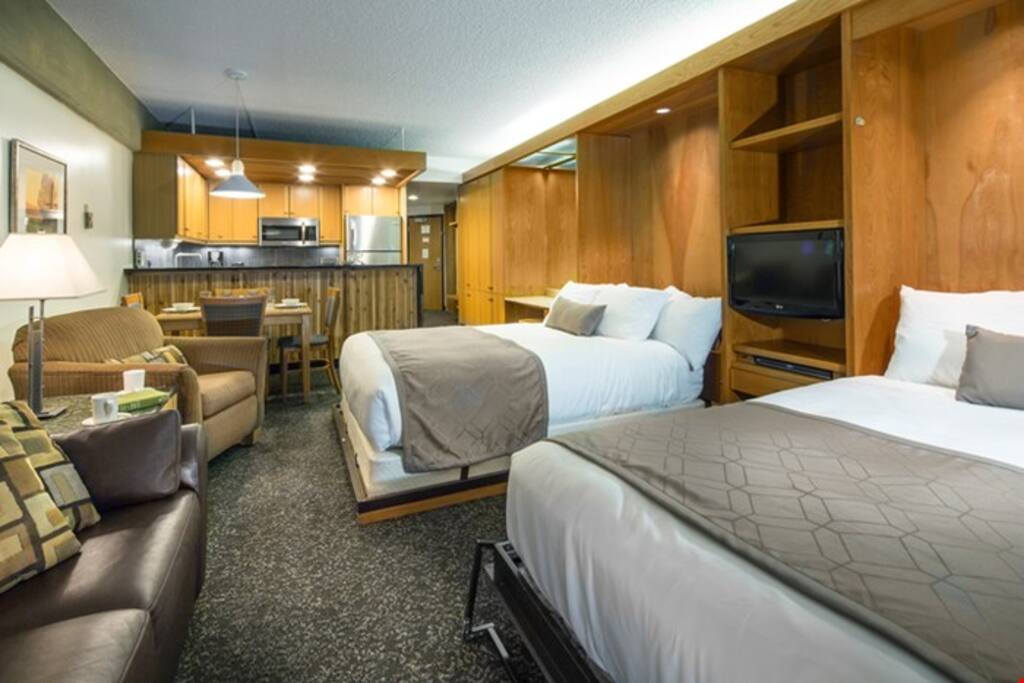 2 queen sized Murphy beds can be tucked away into the wall to create more space.