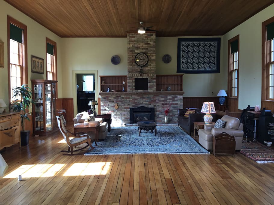 Old school room with reminders of its past life blended with furnishings from around the world
