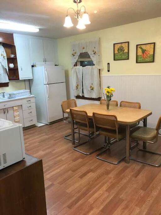 The kitchen viewed from the hallway by the bedrooms.