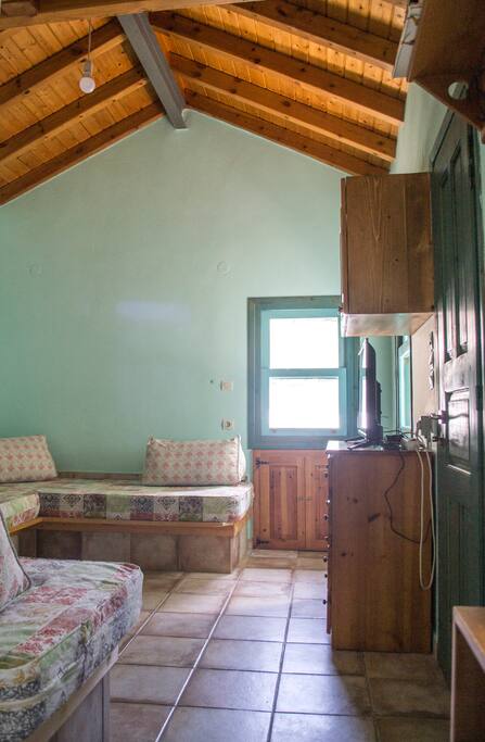 The second room with three sofa beds and possibility to accommodate one more folded bed