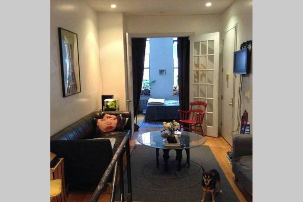 This is the first floor of the apartment, with living room and TV