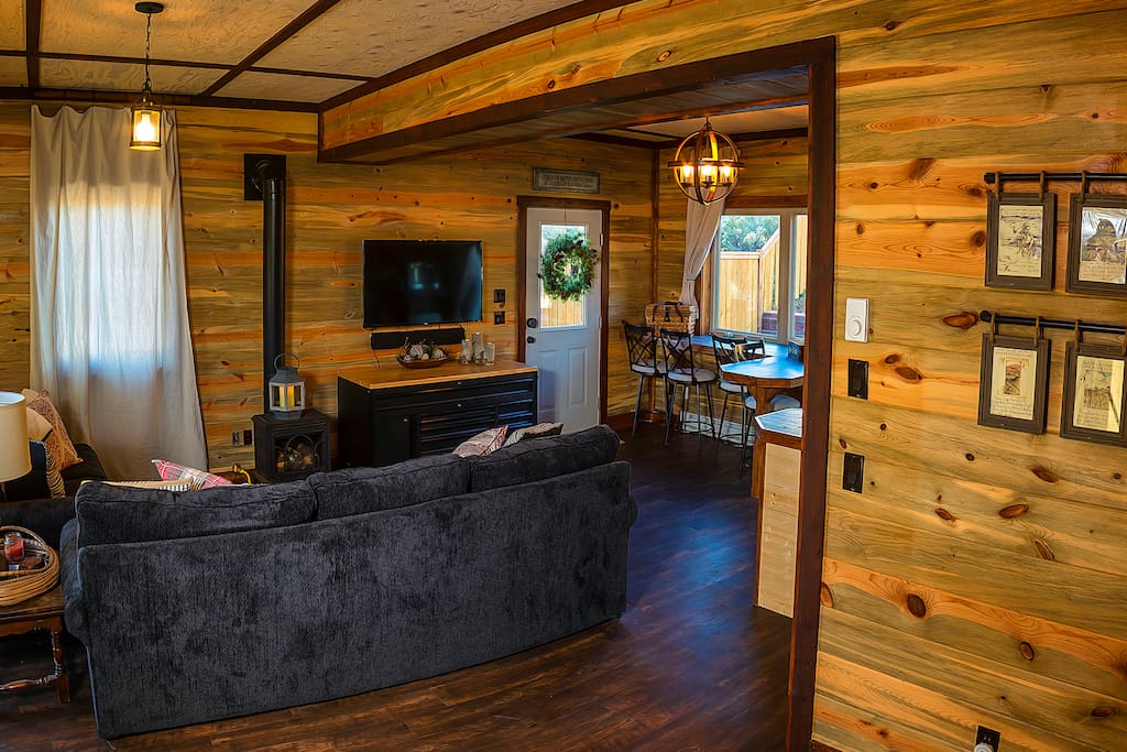Enjoy a movie on the couch next to a warm stove fireplace!