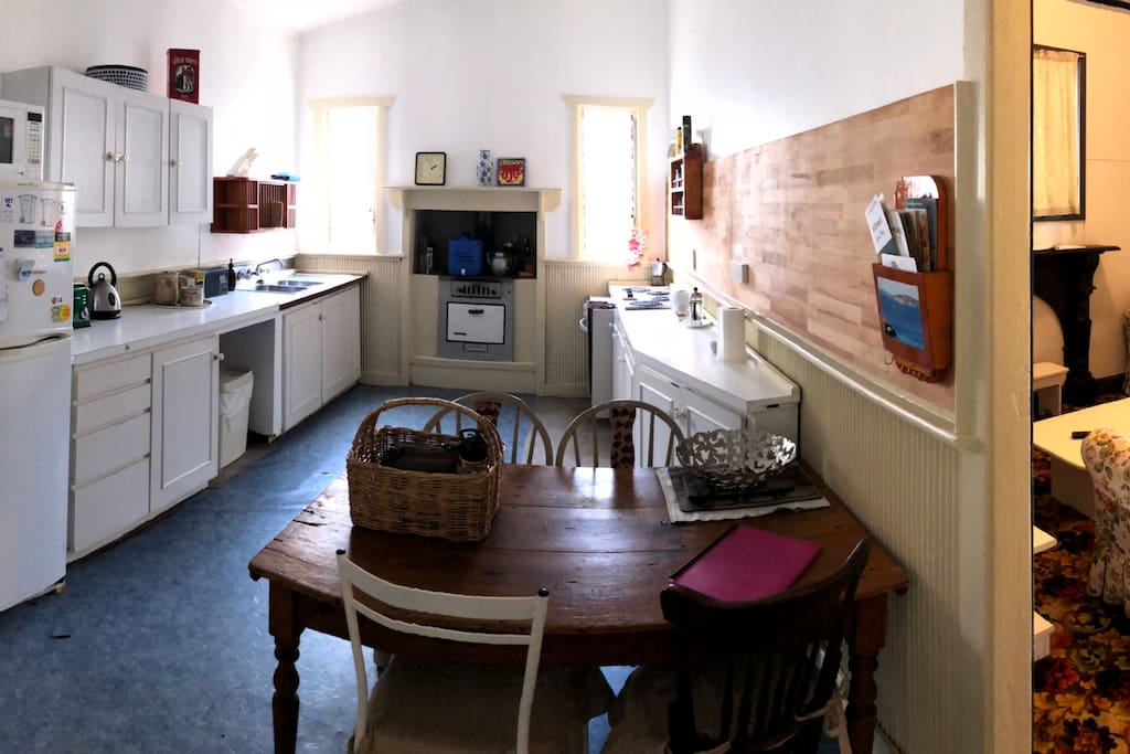 Kitchen fully fitted with electric oven and hot plate, fridge and microwave.