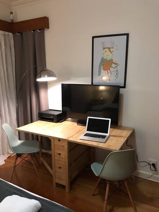 Private TV and work space, including printer.
