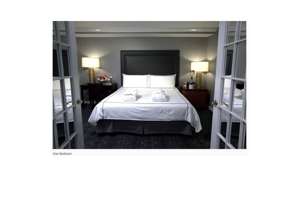 Master Bedroom in 1 BR Luxury Suite