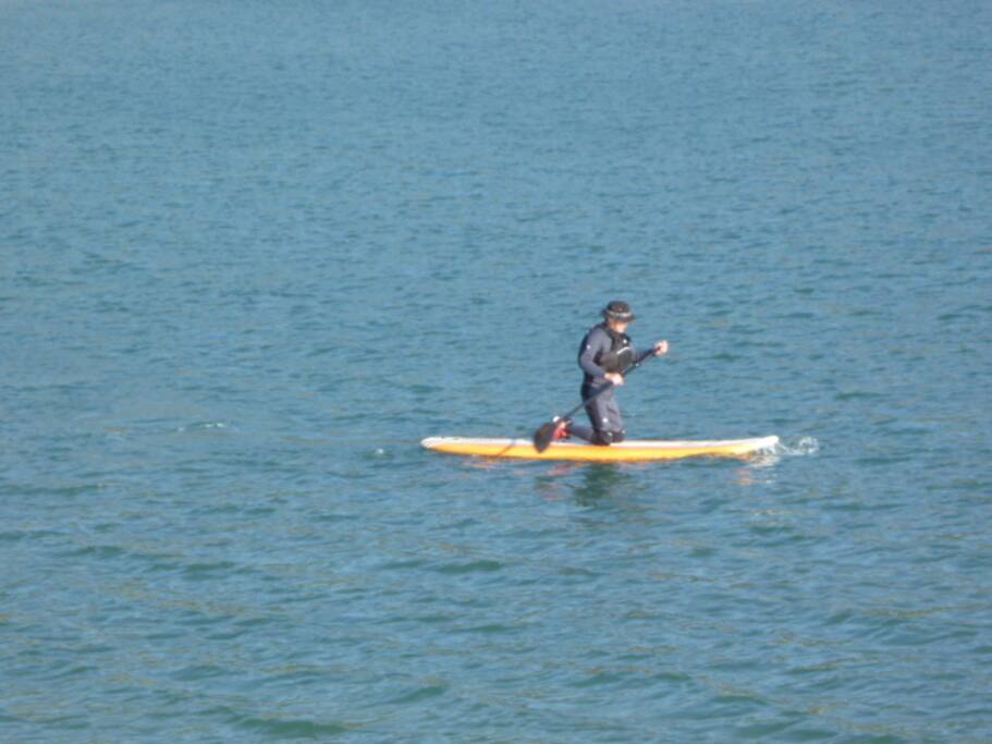 Playing with Stand Up Puddle boat in Summer