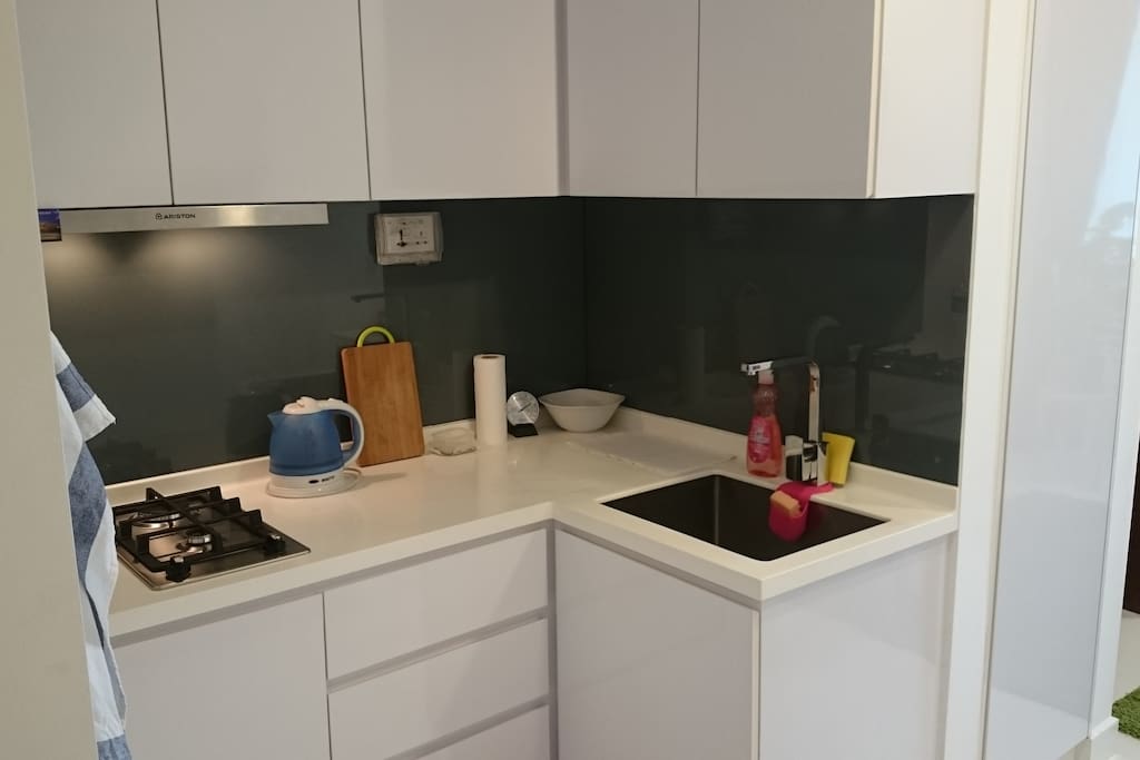 Kitchen includes gas stove, tableware, cutlery and space to store your own items.