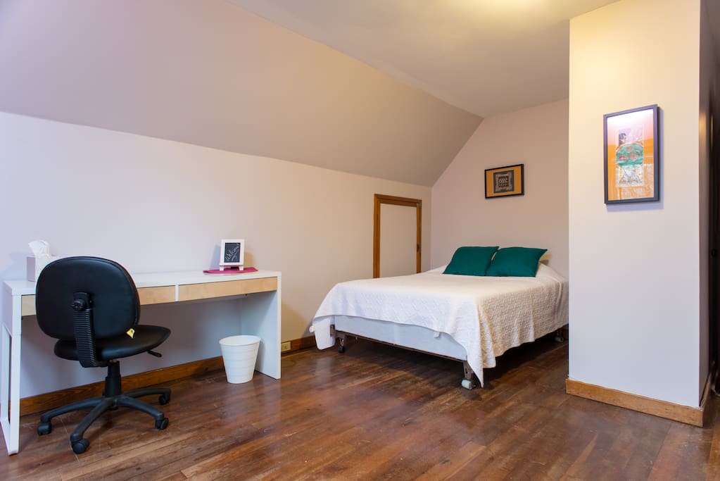 Room 1: full sized bed and futon