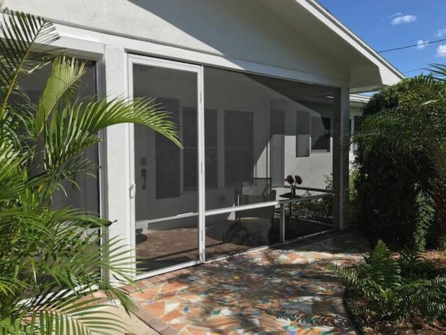 Palms and bright traditional Cuban tile await