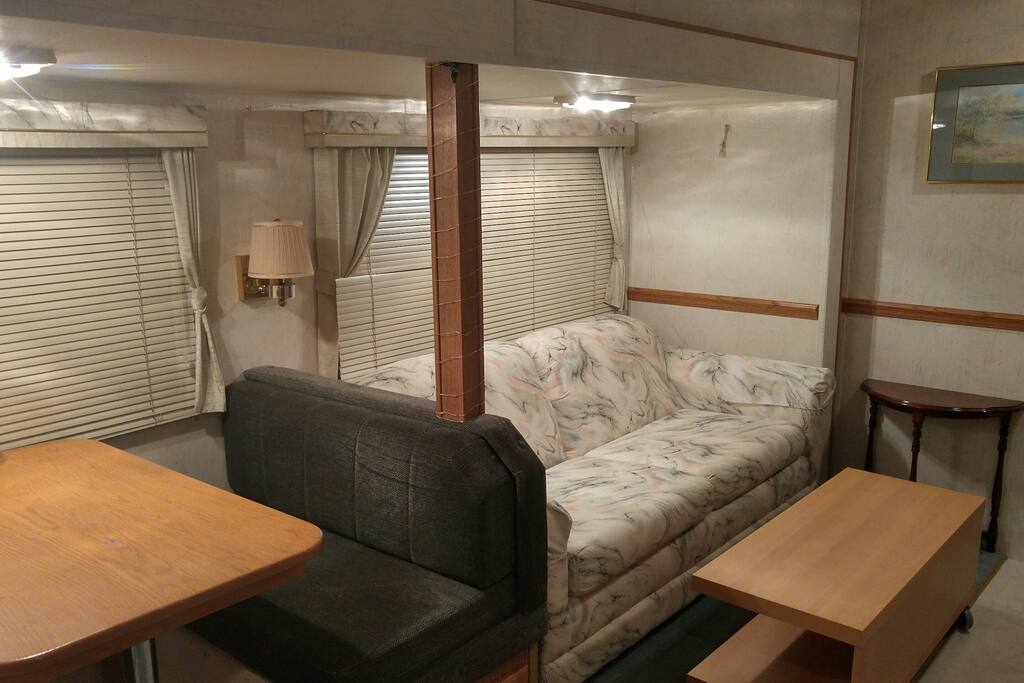 sofa bed and dining area