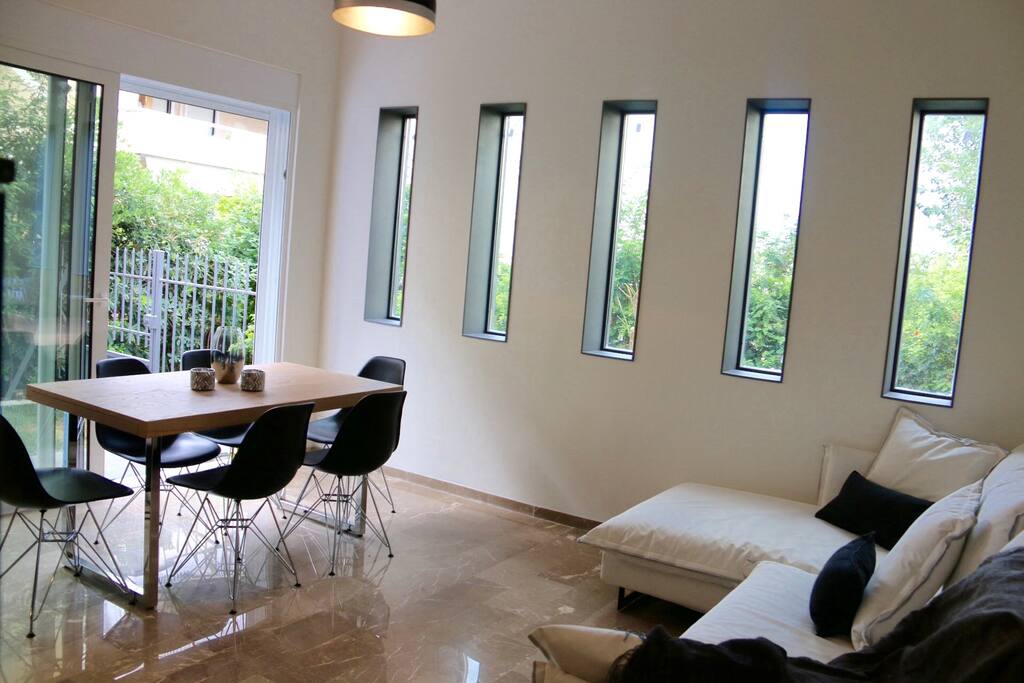 Living/Kitchen Area which opens to private courtyard and washing machine.