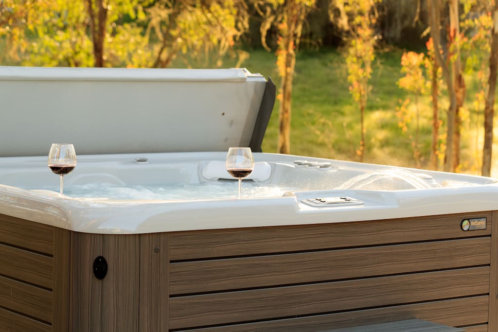 The clean, well-maintained Hotspring Vanguard hot tub seats up to six people.
