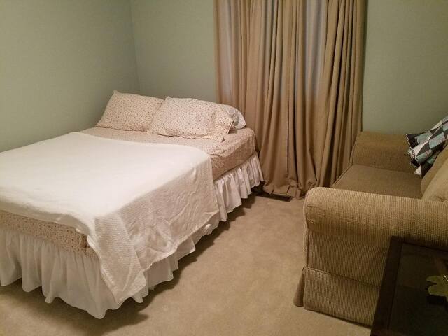 Cozy room on quiet street.