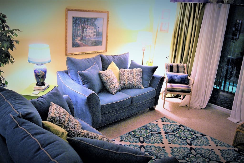 Comfy sofas and chairs make the living spaces warm and inviting.
