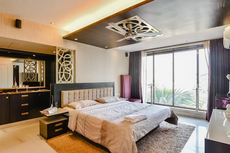Comfortable bedroom in a Penthouse at Bandra West