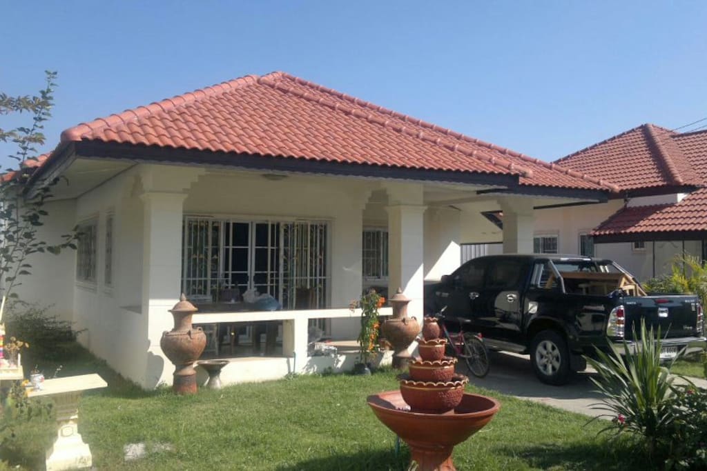 Front terrace, double parking and gated garden