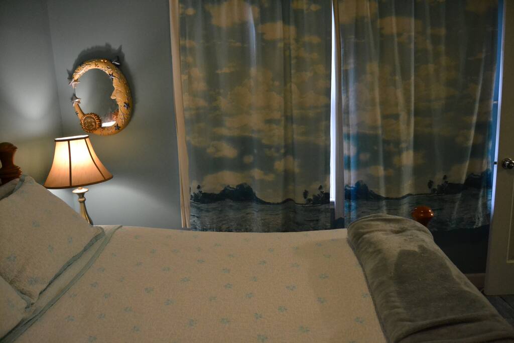 Restful queen bed with tempurpedic topper (just purchased new end tables and lamps, so bed is no longer sandwiched against the wall) Super comfy bed!