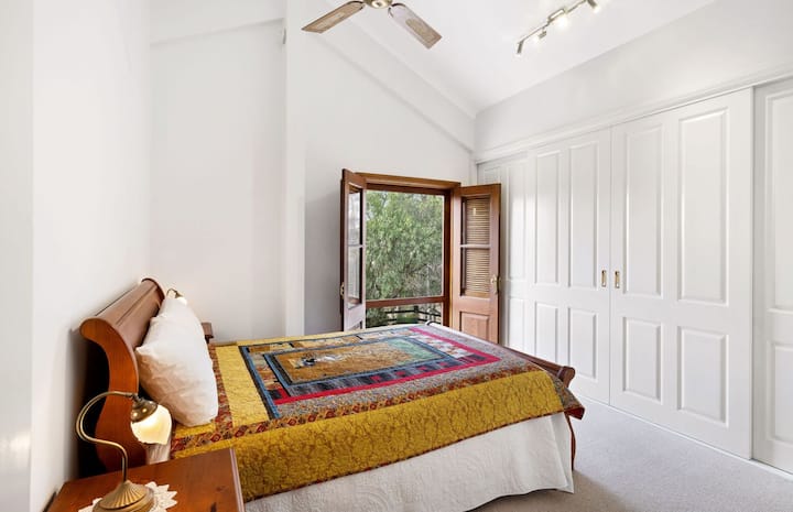King bedroom upstairs in the main house. 