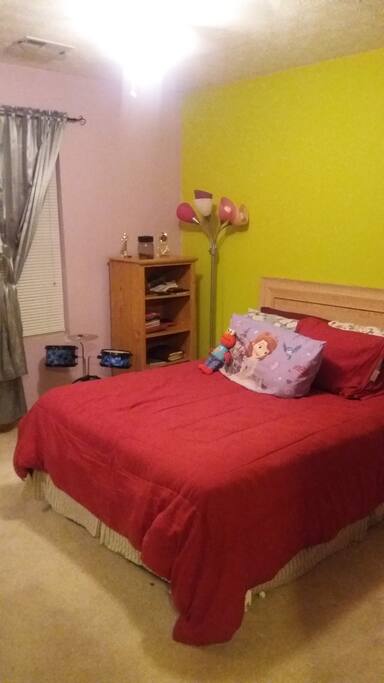 Full size bed with cable ready tv and dvd player.