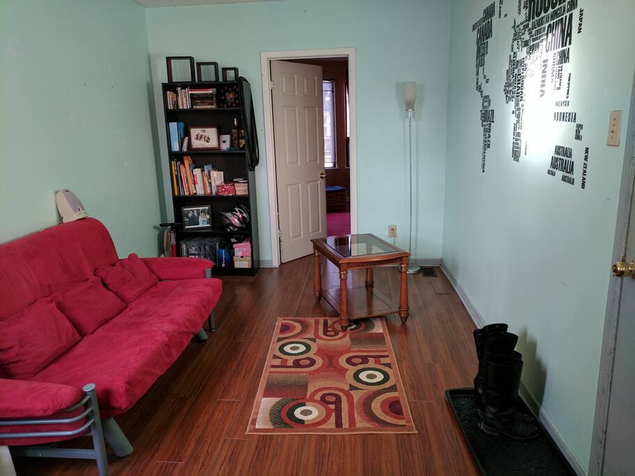 the living room with a sofa bed