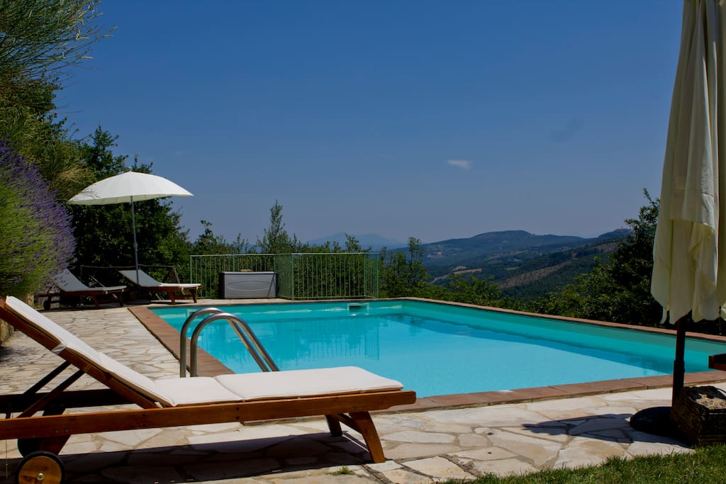 Relax and unwind by the pool, among the olive trees and lavender