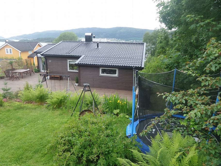 Our big garden has trampoline and small tree house for kid to play.