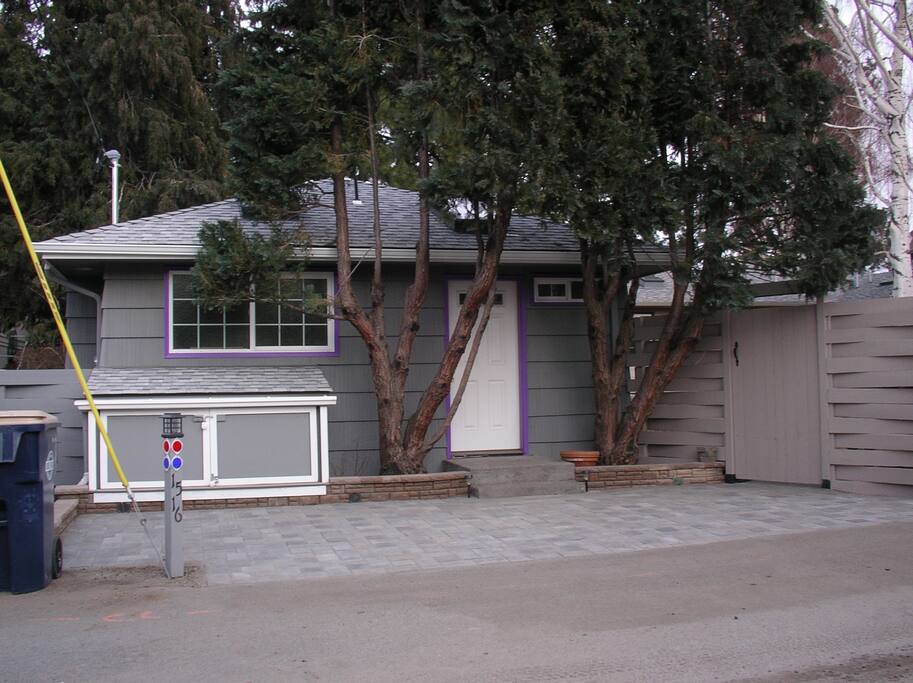 Dedicated parking pad, private entrance and even an EV Charger in the storage unit.